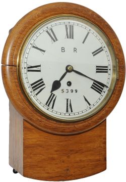 North Eastern Railway 8-inch oak cased iron dial clock with a cast brass bezel manufactured for