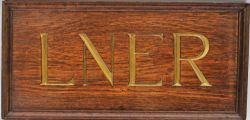 LNER wooden sign with the initials `LNER` cut into the wood and gilded. Measures 21" x 10" and