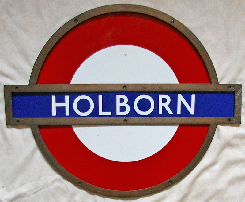 LT Station Target in shaped bronze frame HOLBORN. Three separate enamel sections, the name and two