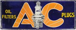 Enamel Motoring Advertising Sign `AC Spark Plugs`. Measures 30"x 12" with some areas of