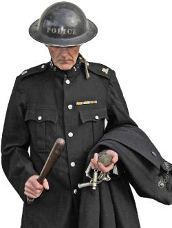 LNER Policeman`s Tunic and Cape with original Truncheon stamped `778 GER`, a pair of Handcuffs, a
