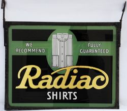 Glass Advertising Sign `Radiac Shirts`. Measures 21" x 16" approx, in metal frame, double sided.