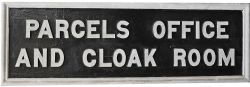 GWR wood with cast letters Platform Sign `PARCELS OFFICE AND CLOAK ROOM`. Measures 55" x 18", in