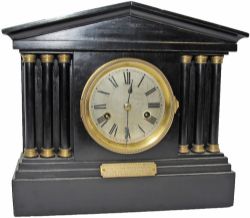 GER  Presentation Clock. Wood ebonised case and strikes on a gong. Presented to Mr T. Lester by