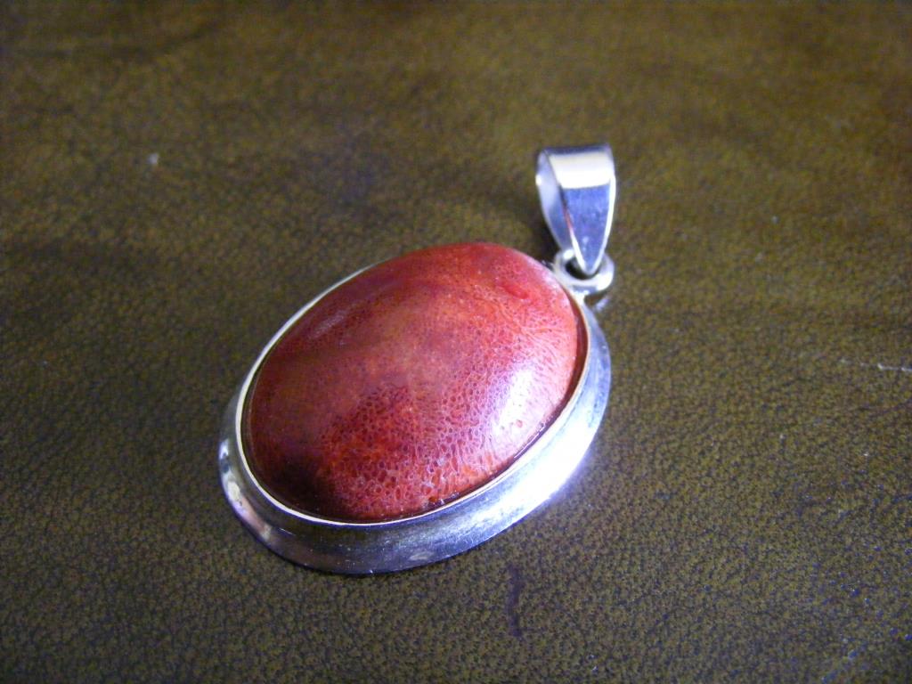 "A white metal Pendant set wth a large oval stone, 925-marked."