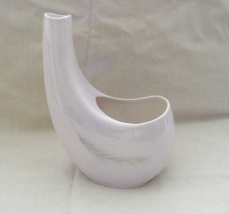 "An Australian Carltonware Planter horn-shaped, with floral decoration, approx 10"."