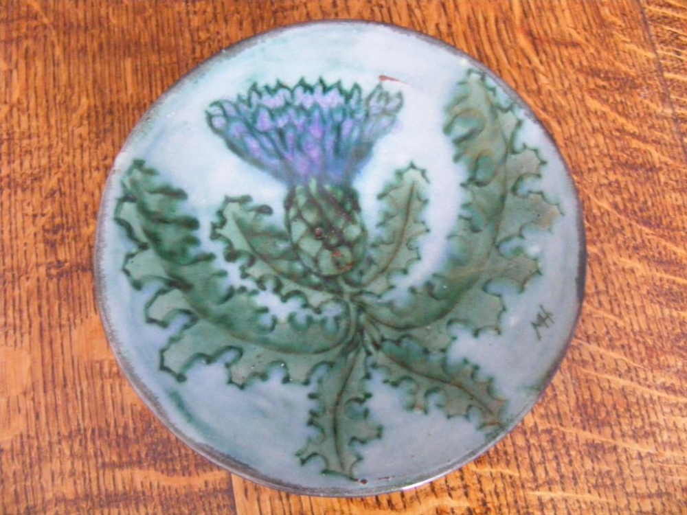 "A Studio Pottery "Thistle" Dish signed MH to rim."