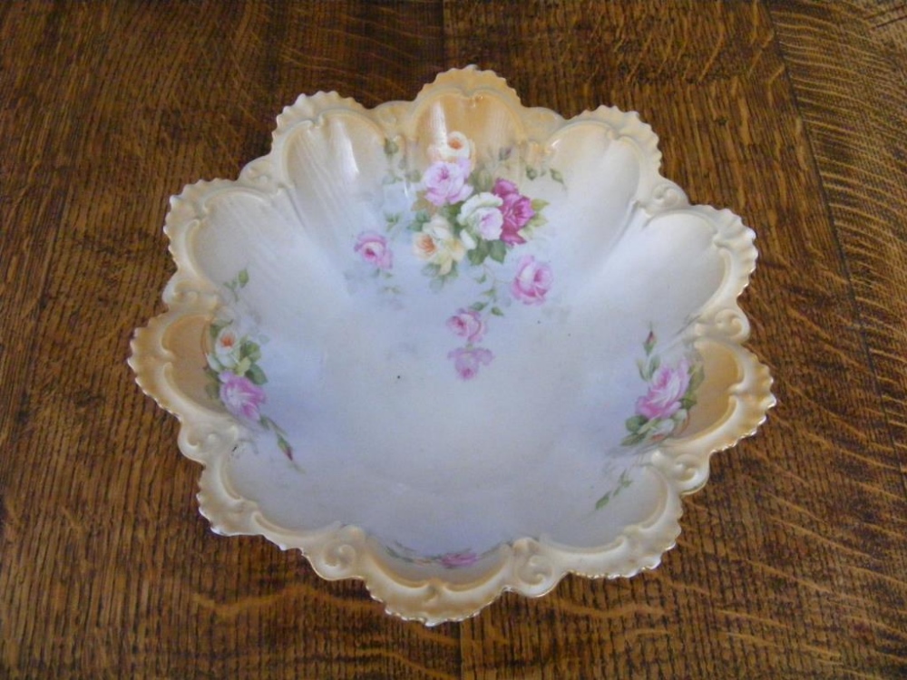 A signed floral Platter together with two Victorian Bowls.