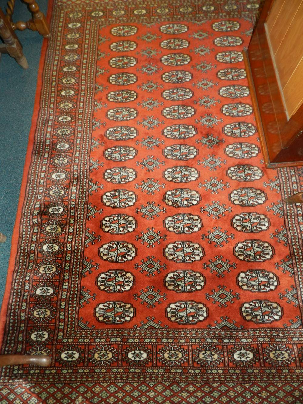 A modern red ground Tekke style rug.