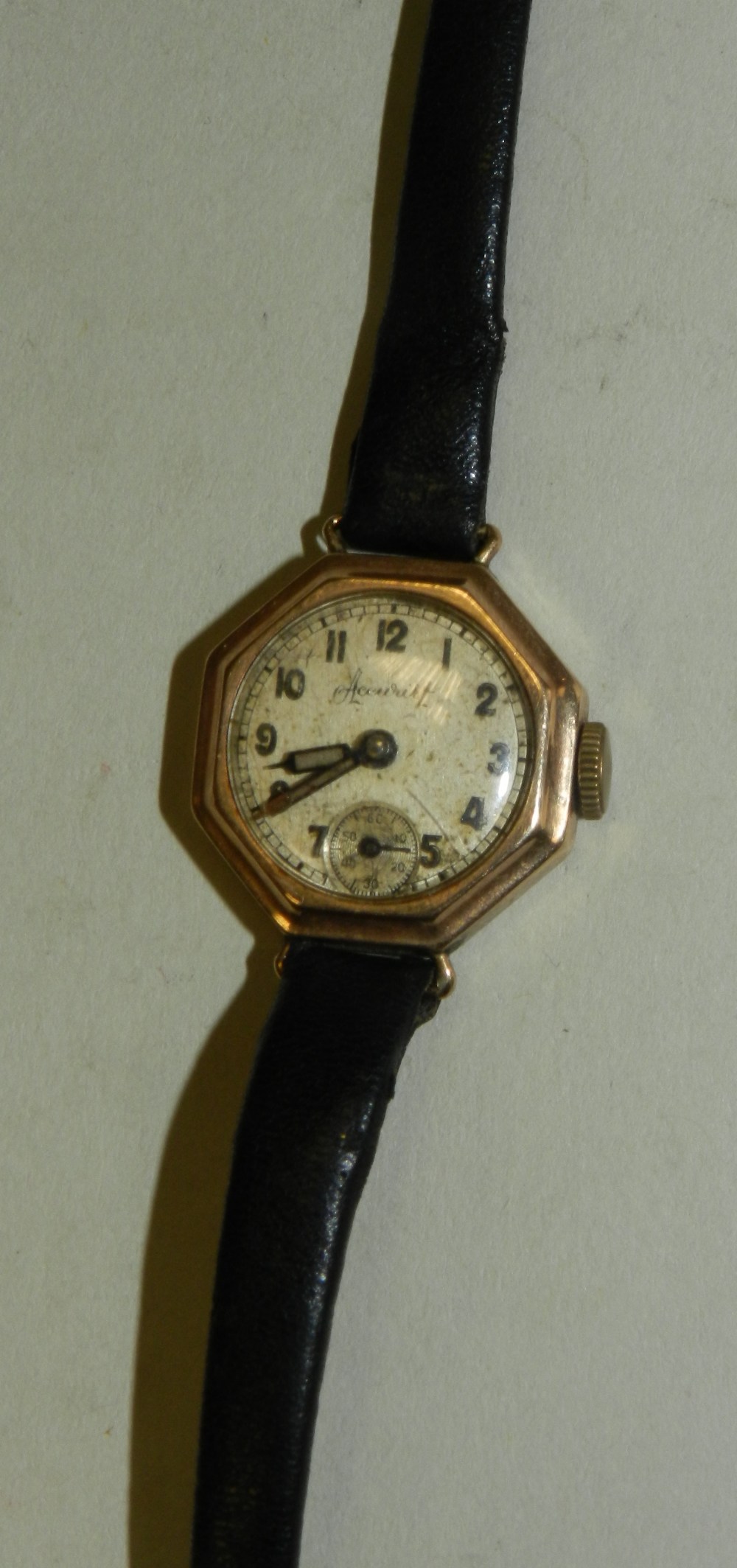 A lady's octagonal Accurist wristwatch with leather strap.