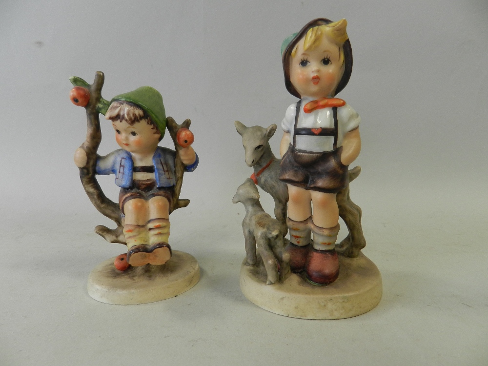 Two Goebel pottery figures, 'Apple Tree Boy' model number 742 3/0 and Little Goat Herder, model