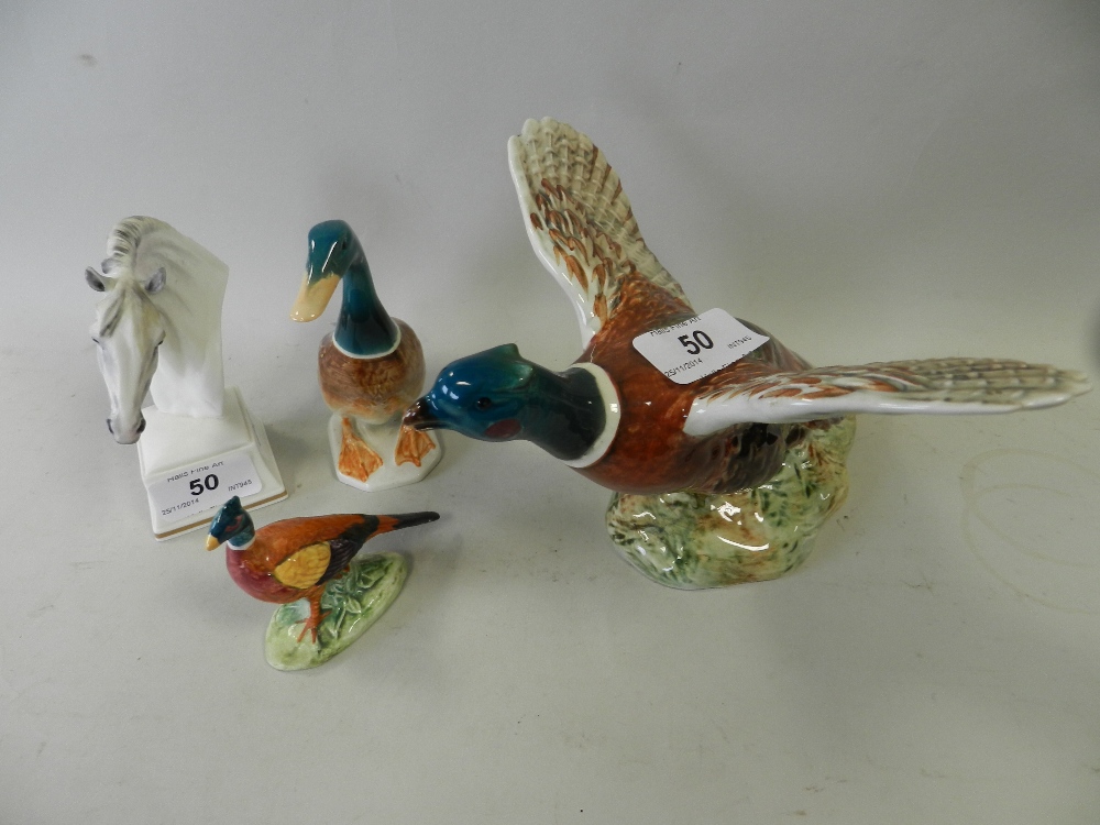 A Royal Worcester model of Bronte, together with a Beswick model of a duck, number 756-2 and two