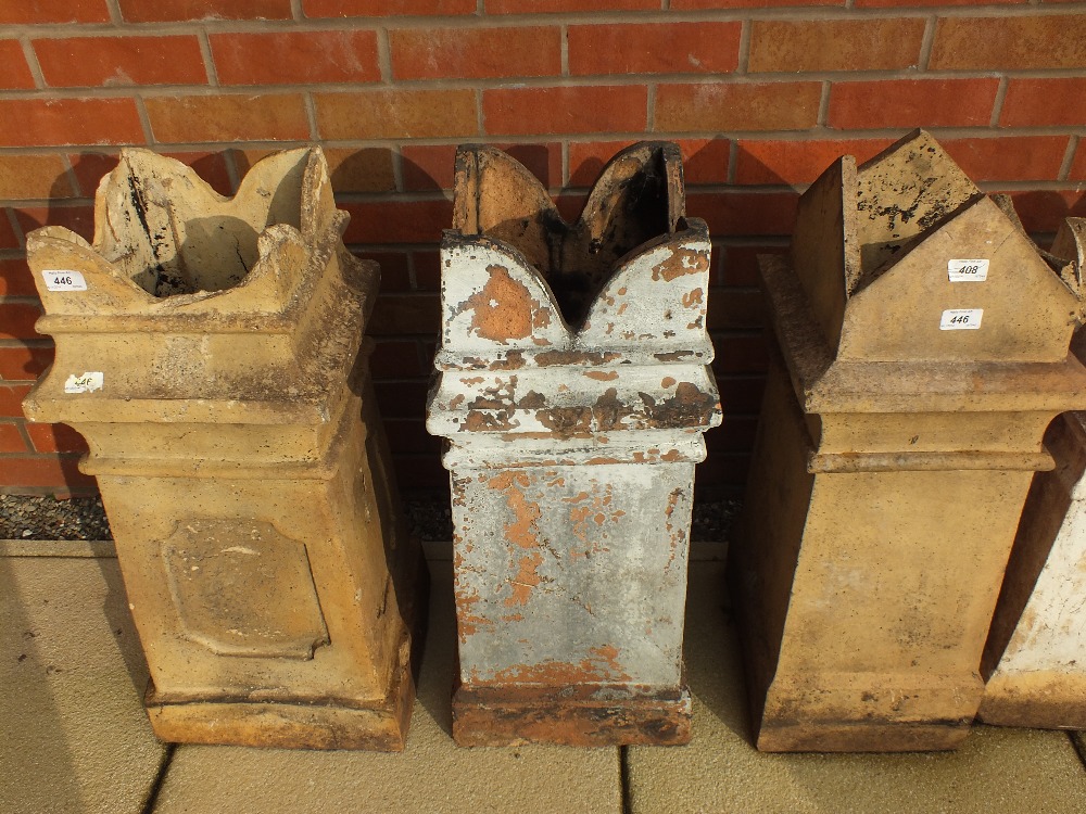 Three terracotta square chimney pots*
