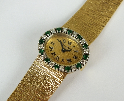 A Lady's 9ct yellow gold Bueche Girod bracelet wristwatch, the oval champagne bark finish dial