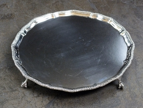 A circular silver salver, Thomas Bradbury & Sons Ltd, London 1924, of shaped circular form with