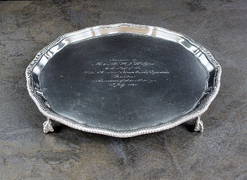 A silver presentation salver, Thomas Bradbury & Sons Ltd, Sheffield 1917, of circular form with