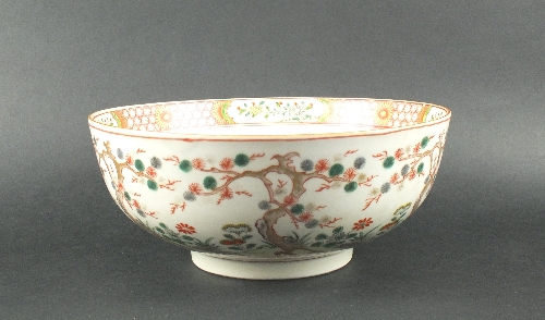 A Chinese porcelain famille verte bowl, late 19th century, decorated to the exterior with blossoming