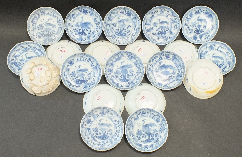 Ca Mau: Twenty blue and white Peacock Pattern saucers, circa 1725, each centrally decorated with a
