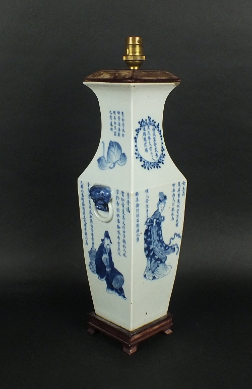 A Chinese porcelain faceted blue and white baluster vase, Qing Dynasty, 19th century, decorated to