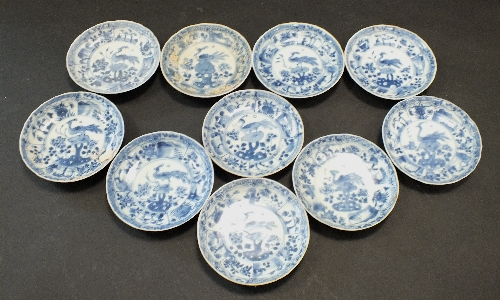 Ca Mau: Ten blue and white Peacock Pattern saucers, circa 1725, each centrally decorated with a