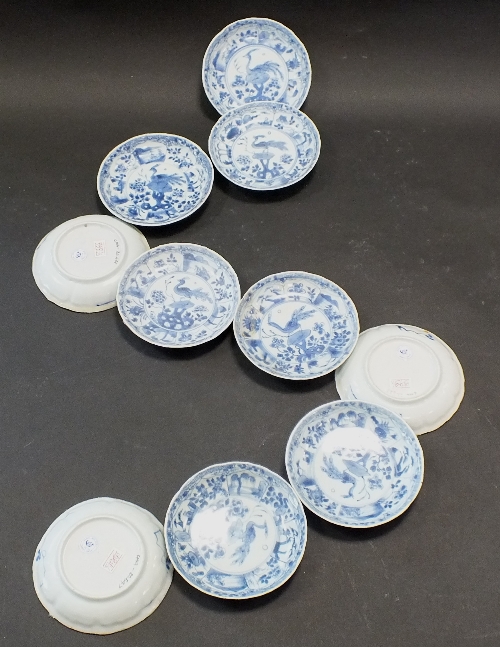 Ca Mau: Ten blue and white Peacock Pattern saucers, circa 1725, each centrally decorated with a