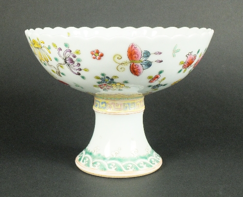 A Chinese porcelain famille rose stem cup, Republic Period (c. 1912-1949), with foliate rim and