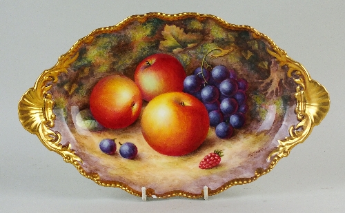 A Royal Worcester fruit-painted dessert dish, circa 1950, oval with twin handles, painted by Harry