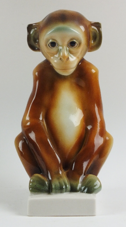A Schwarzburger Werkstätten für Porzellankunst porcelain model of a seated monkey, circa 1909-