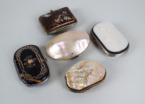 A tortoiseshell and yellow metal 19th century coin purse (lacking interior), along with three mother