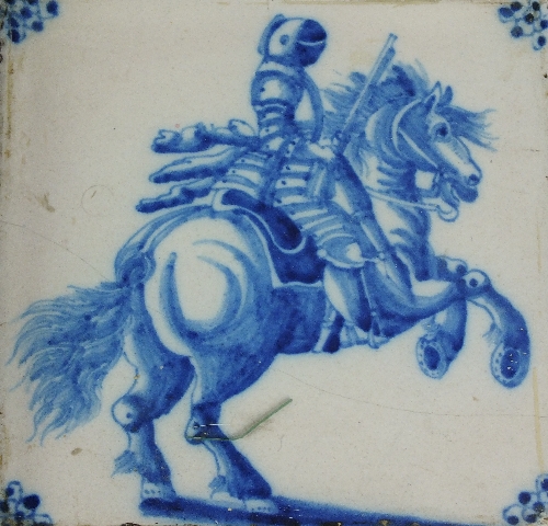 A collection of sixteen English Delft pottery tiles, 18th century, painted in blue and white with