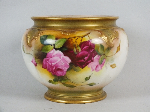 A Royal Worcester jardiniere, dated 1919, shape number 276, the quatrelobe body painted with roses