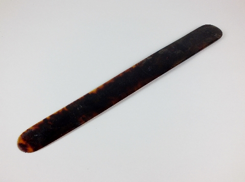 A 19th century tortoiseshell page turner of tapering form, 41.5cm long