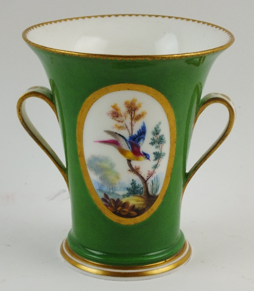 A Sevres style tapered beaker vase with twin handles, 19th century, the dark green ground painted