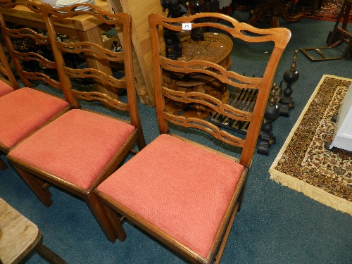A set of six George III design mahogany ladder back dining chairs with drop-in seats on moulded