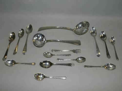 An 18th century silver sifter spoon together with a George IV silver ladle; two Irish silver