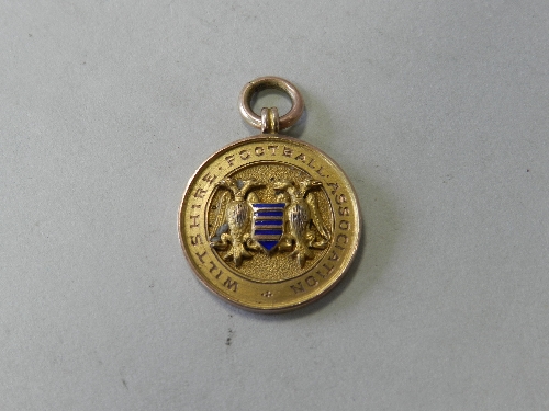 A 9ct gold Wiltshire Football Association medal, engraved 'Secretary 1924-5'