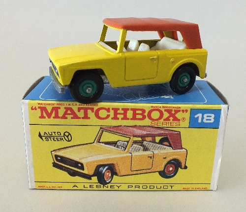 A boxed Matchbox Regular Wheel series 18, a Field Car in yellow with white interior, fitted with
