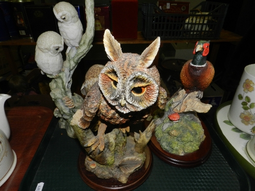 A Thistle green limited long eared owl model T G 255 together with a Teviotdale owl group No.43/500,