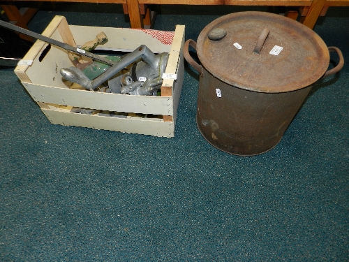 A patent canning machine together with an old iron and a sterilising Dixy and cover
