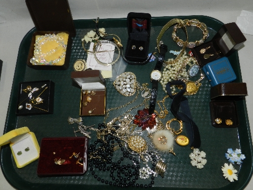 An assortment of silver and costume jewellery (one tray)