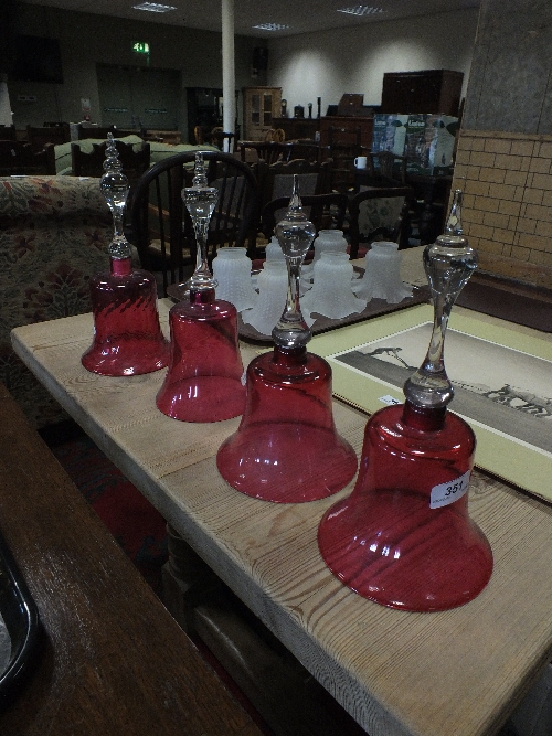Four cranberry glass bells (no clangers)
