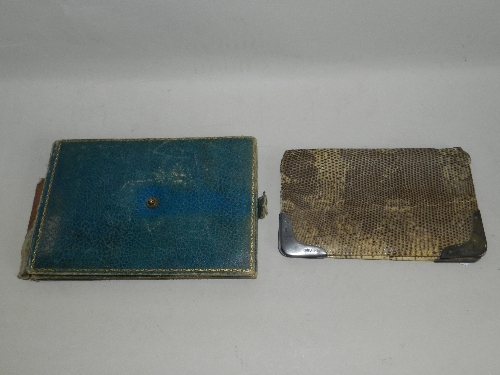 A silver mounted snake skin purse, London, 1891 together with a leather cased mirror ((at fault))