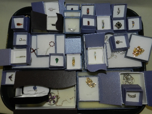 A large collection of modern gem set silver and silver gilt jewellery predominately rings and