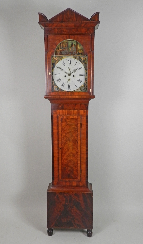 A mid-19th century mahogany eight day longcase clock, the 14 inch arched enamel dial with centred
