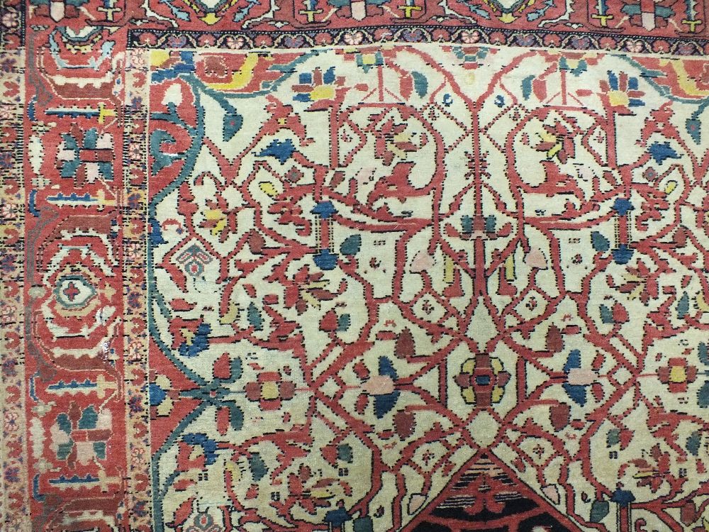 A Saroukh Feraghan Rug, West Persia,
the ivory lattice field of scrolling angular vines centred by a - Image 3 of 4