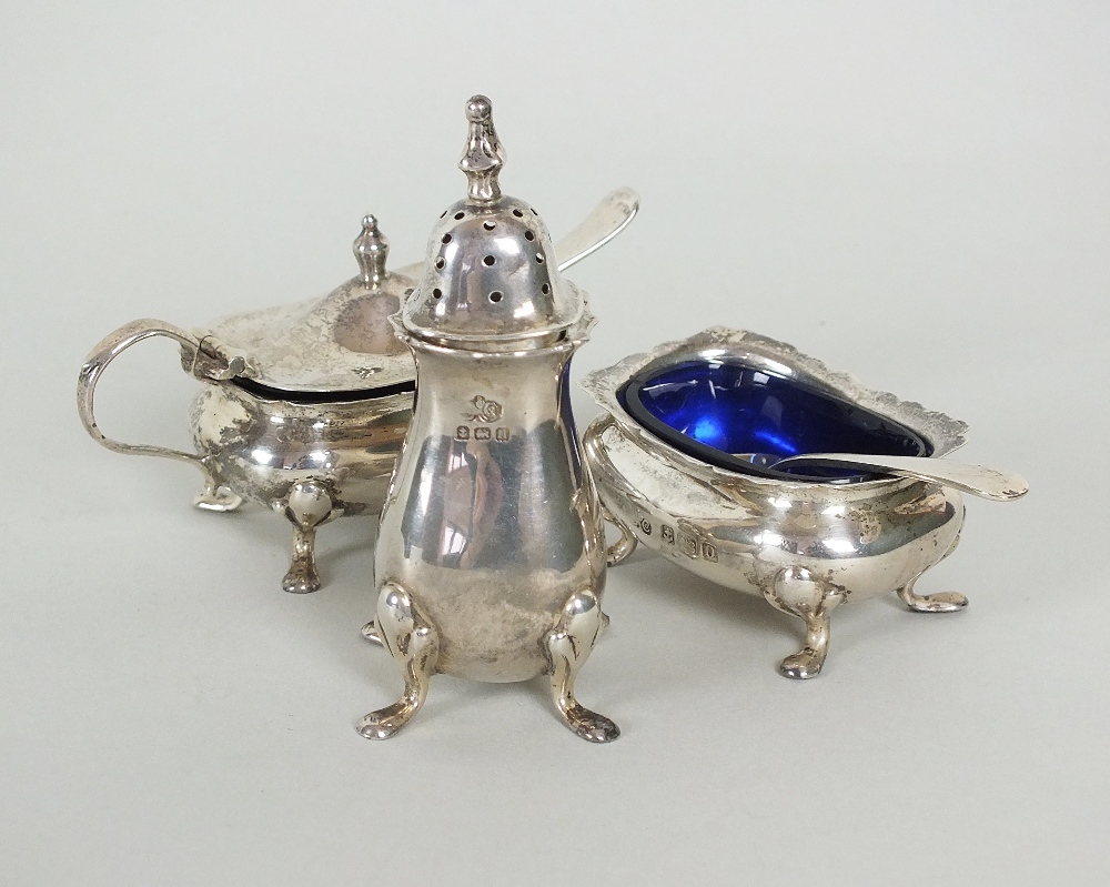 A three piece silver cruet set, Elkington & Co Ltd, Birmingham 1912 & 1913, each of plain polished