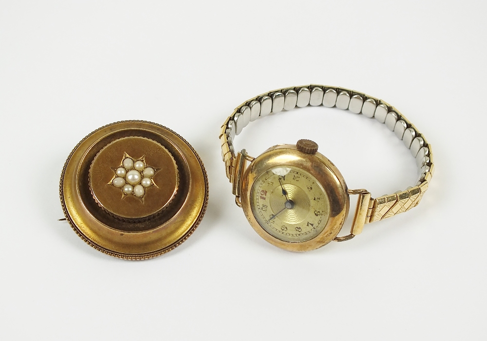 A Victorian half seed pearl set mourning brooch, with vacant back, together with a rolled gold