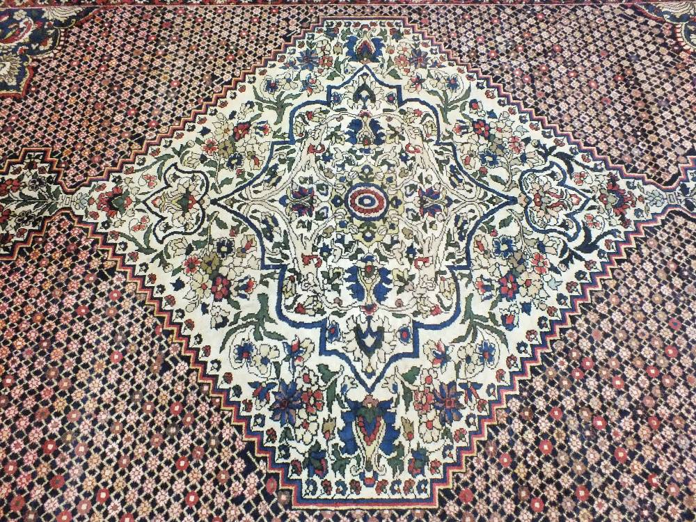 Bakhtiari rug, West Persia,
the lattice field centred by a pole medallion framed by meandering - Image 2 of 2