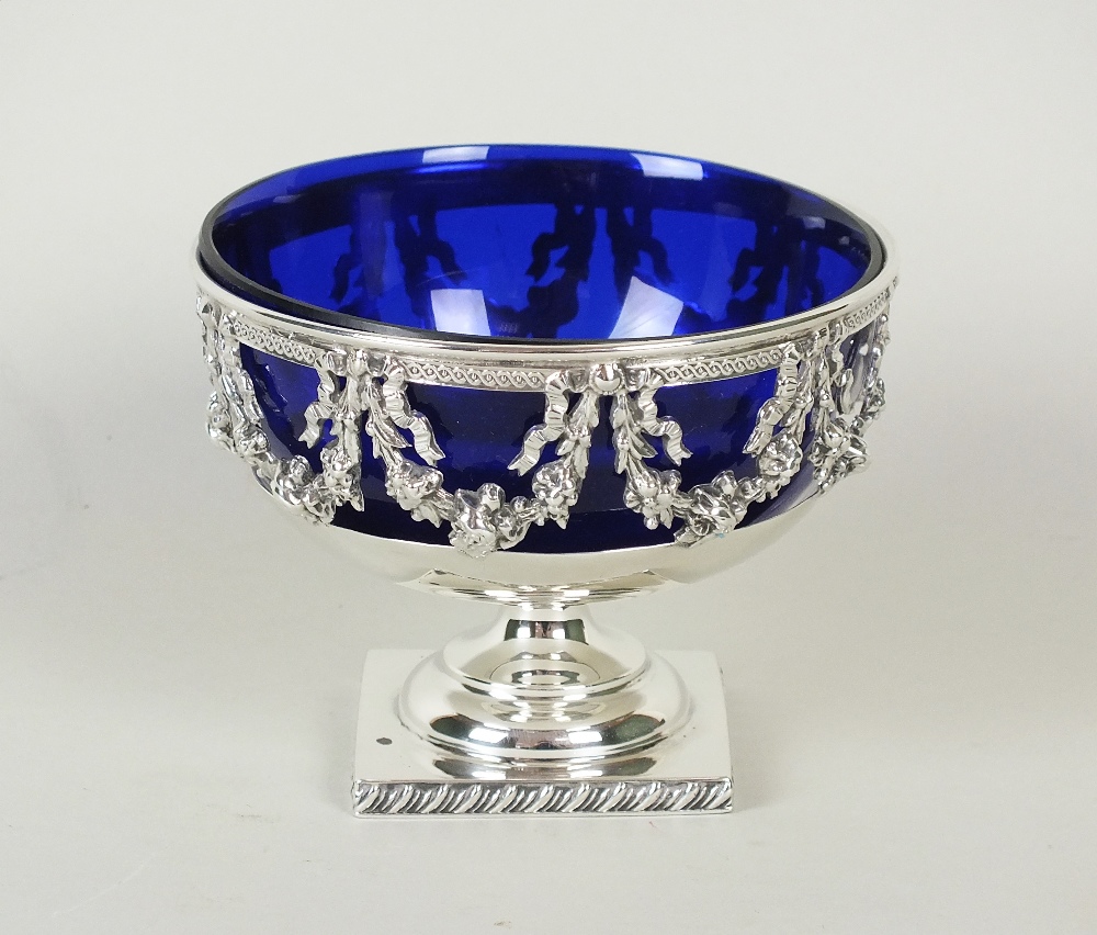 An Edwardian pedestal silver sugar bowl, makers mark rubbed, Birmingham 1906, of circular form