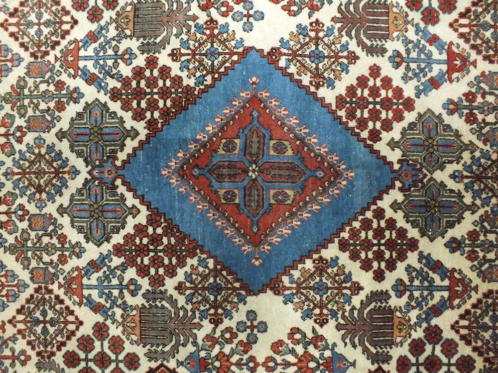 A Fine Motaschem Kashan Rug, central Persia,
the ivory lattice field of Joshaghan plant design - Image 2 of 3